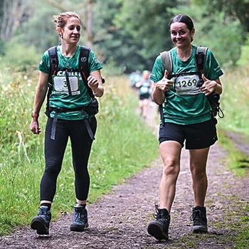 Laura and Tanya Walking on a Path