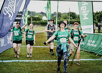Two of the P & B trailblazers crossing the finish line with others