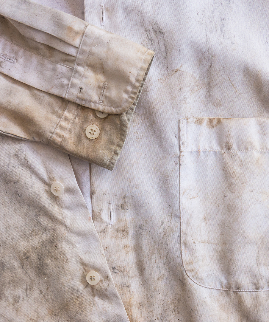 muddy stained shirt
