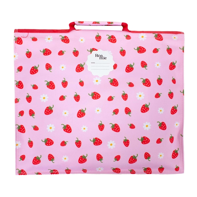 Reverse view of eco-friendly strawberry book bag showing name label